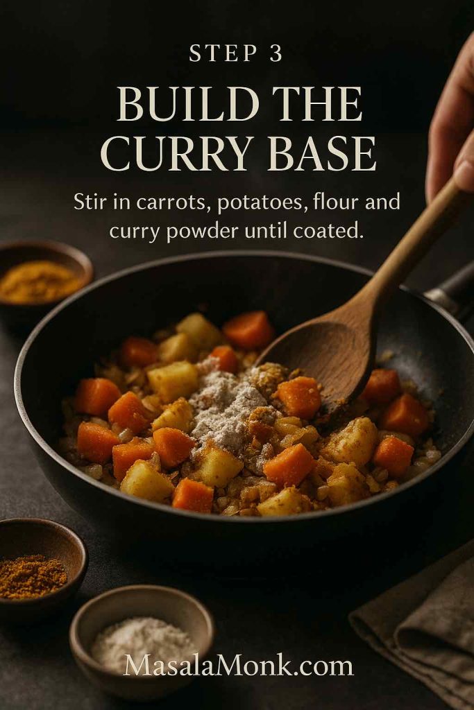 Carrots and potatoes coated with flour and curry powder in a pan for katsu curry base.