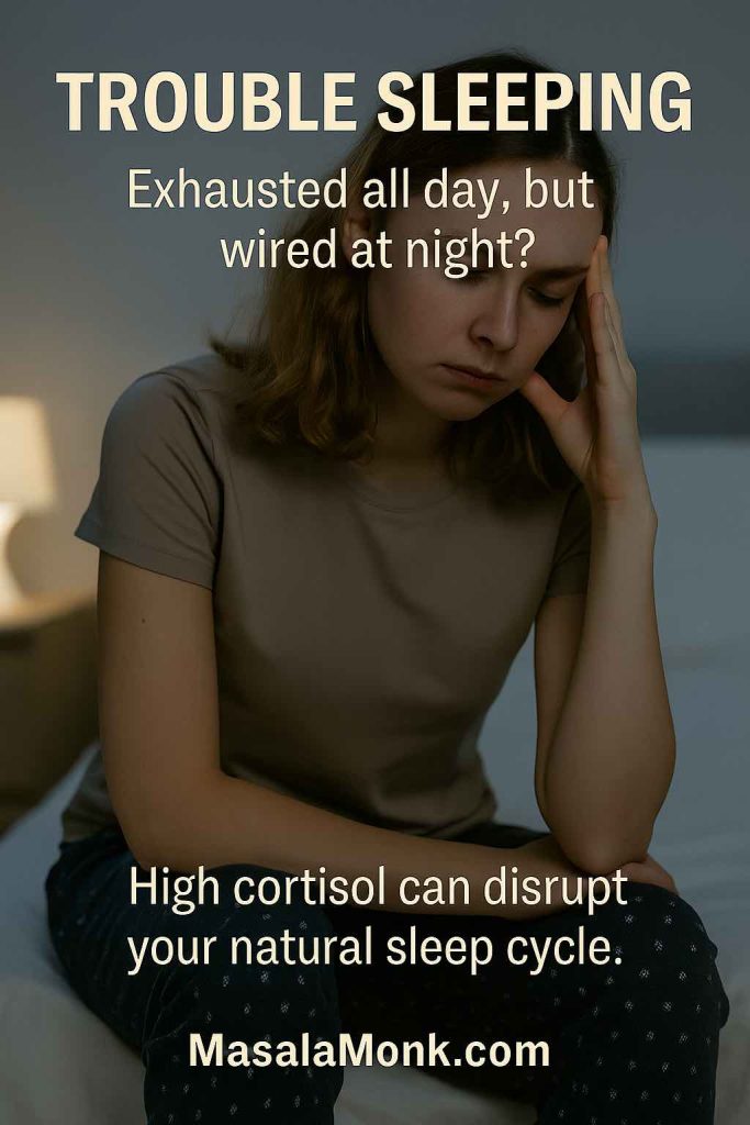 Fatigued woman sitting on bed at night, struggling with insomnia and sleep troubles due to high cortisol.