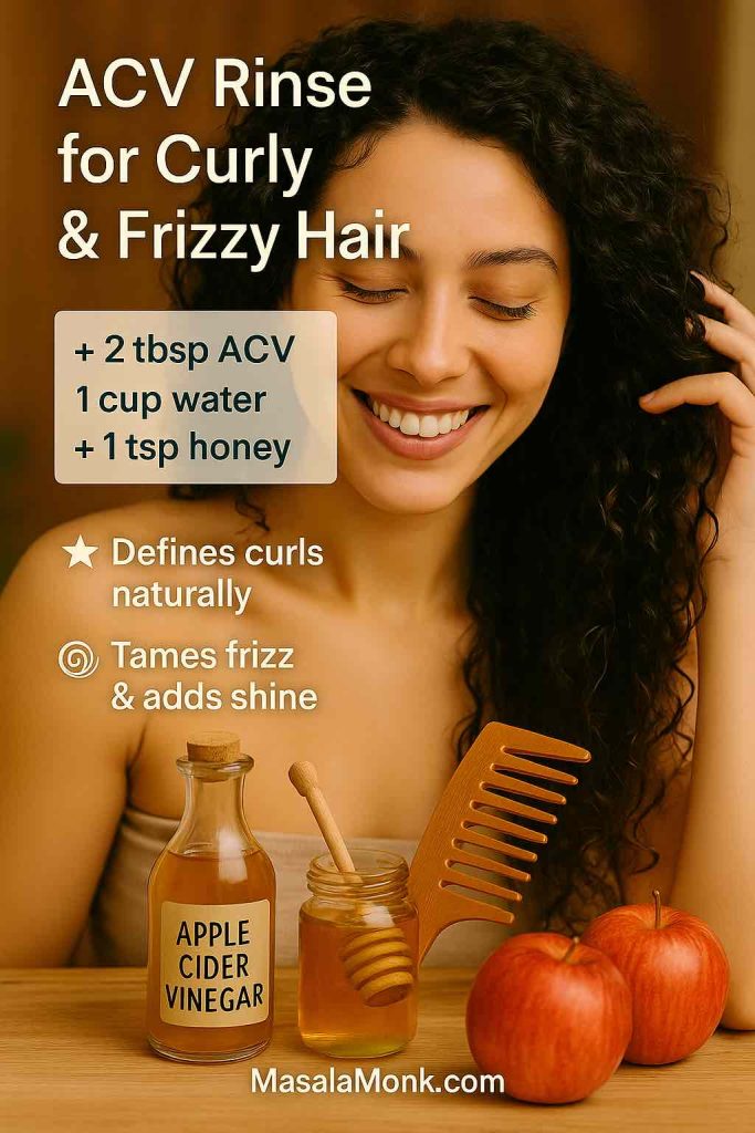 Photorealistic image of a smiling woman with curly hair applying apple cider vinegar rinse through her curls. Ingredients shown: ACV bottle, honey jar with dipper, apples, wide-tooth comb. On-image overlay displays recipe (2 tbsp ACV + 1 cup water + 1 tsp honey) and benefits: defines curls naturally, tames frizz & adds shine. MasalaMonk.com footer.