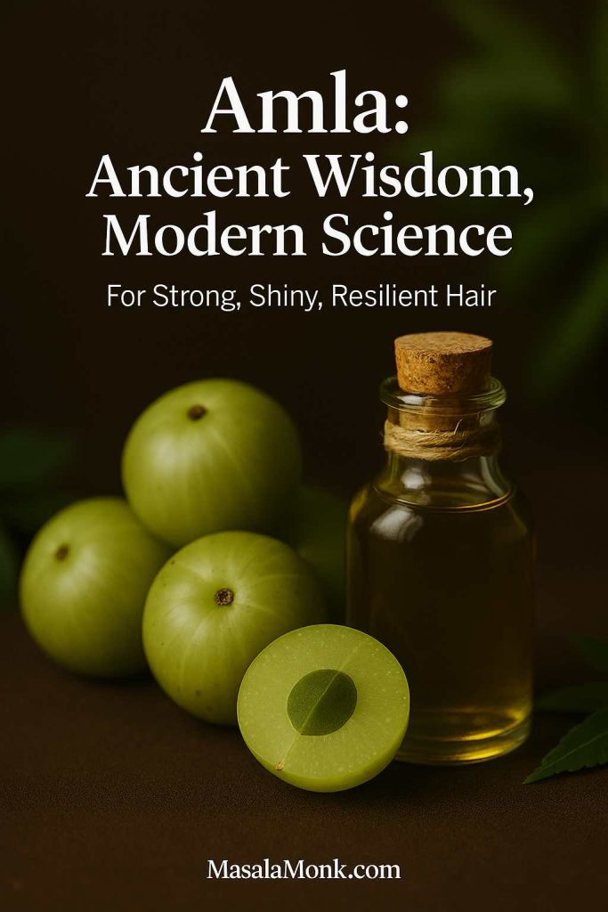 Luxury editorial photo of amla fruits and oil bottle with greenery, text overlay reads ‘Amla: Ancient Wisdom, Modern Science.’