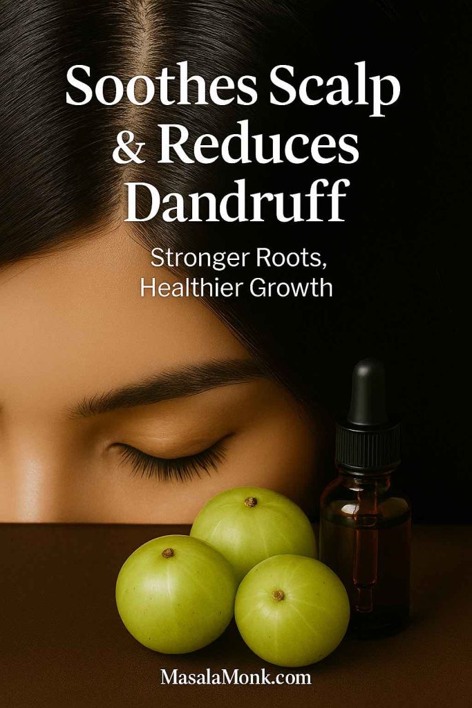Close-up of a healthy, clean scalp and shiny roots with amla fruits and oil dropper nearby, text overlay reads ‘Soothes Scalp & Reduces Dandruff.’