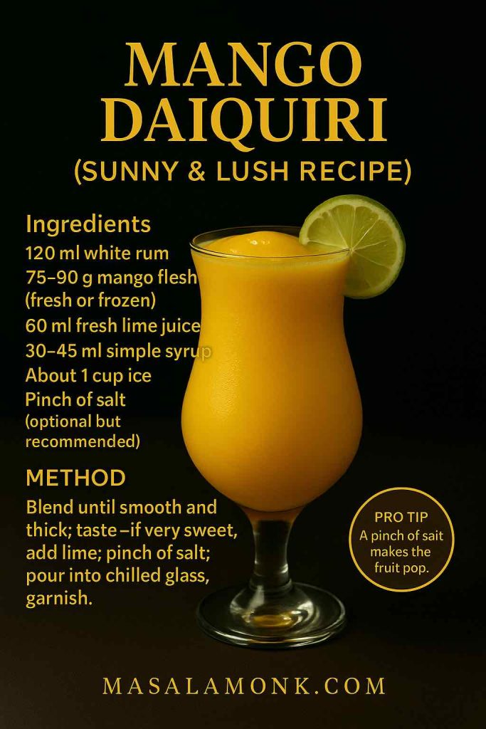 Mango Daiquiri recipe card in a chilled coupe; sunny yellow drink with lime, overlay lists rum, mango, lime, simple syrup, ice, and a pinch-of-salt tip — MasalaMonk