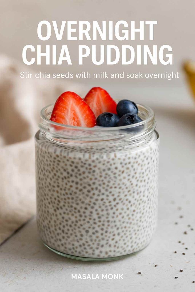 Jar of overnight chia pudding topped with fresh strawberries and blueberries.