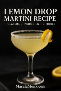 Lemon Drop Martini recipe in a chilled coupe with a delicate sugar rim and lemon twist, bright pale-gold cocktail on a dark backdrop.