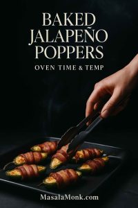 Hand plating bacon-wrapped baked jalapeno poppers on a tray — oven time and temp guide by MasalaMonk