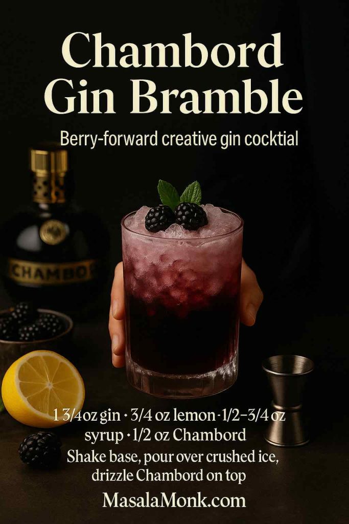 Chambord gin bramble cocktail in a short glass filled with crushed ice, deep purple hue, topped with blackberries and mint, with lemon, berries and a Chambord bottle in the background and a mini gin cocktail recipe overlaid, MasalaMonk.com branding at the bottom