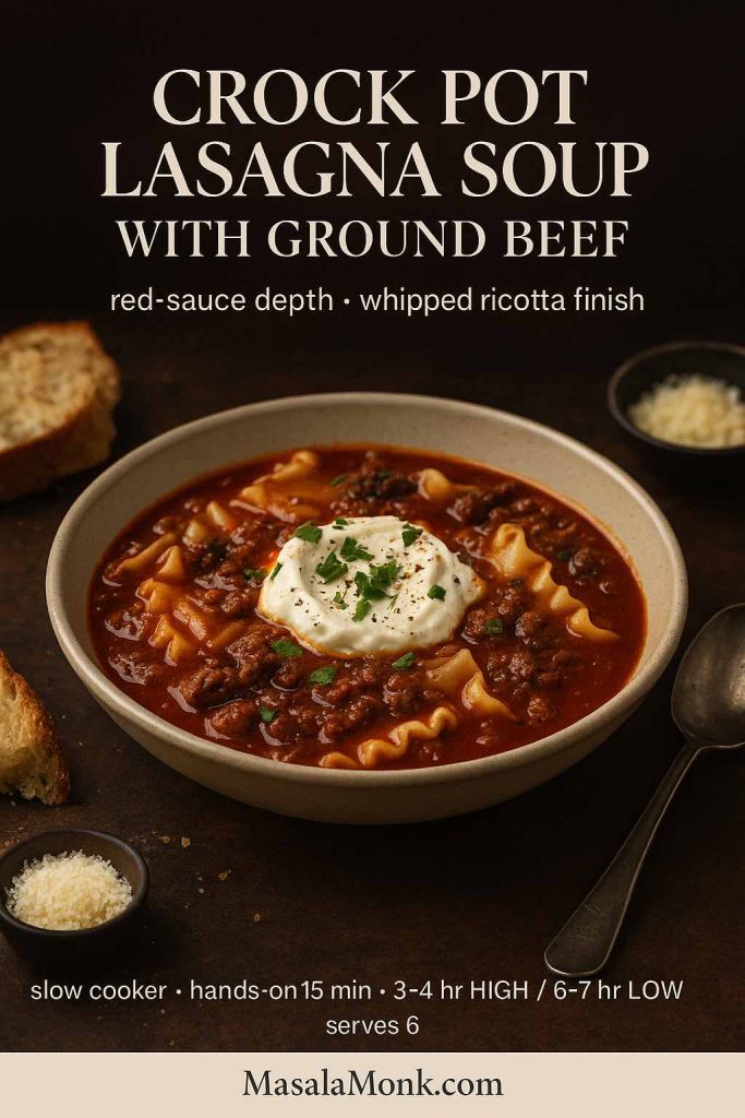 Ground-beef lasagna soup in a stoneware bowl with tomato broth, ruffled noodles, whipped ricotta, parsley, and cracked pepper; slow-cooked.