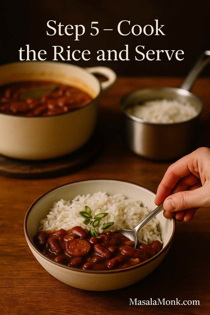 Bowl of red beans and rice with sausage and green onions, with a hand holding a spoon and the pot of beans and pan of rice in the background, labeled Step 5 Cook the Rice and Serve.