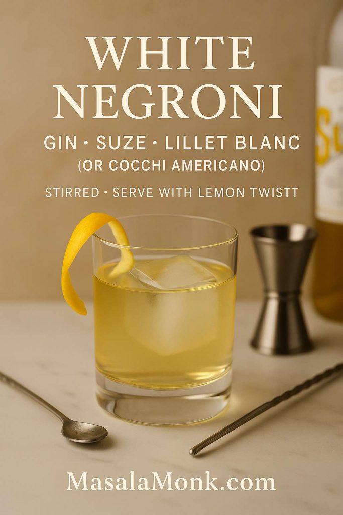 White Negroni recipe card—gin, Suze, Lillet Blanc (or Cocchi Americano)—stirred over a large cube with lemon twist; marble surface, bar spoon and jigger; MasalaMonk.com footer.
