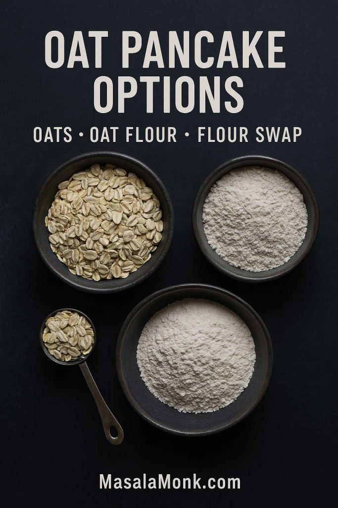 Portrait flatlay showing oats, oat flour, and flour swap options in dark bowls with a measuring spoon, featuring text overlay “Oat Pancake Options” and “Oats • Oat flour • Flour swap,” with MasalaMonk.com in the footer.