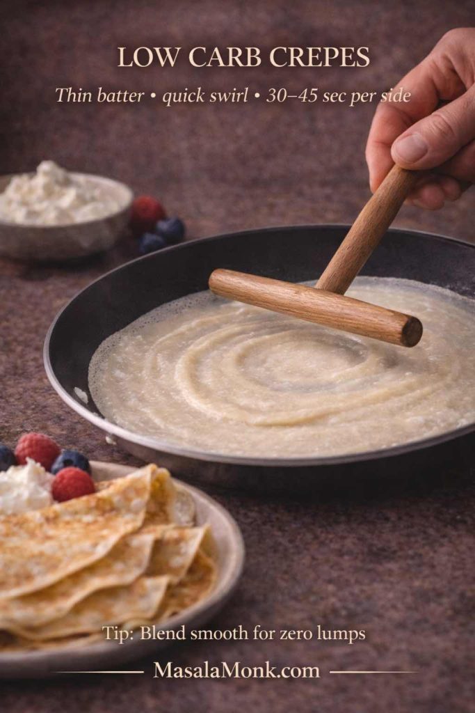 Low carb crepe batter being swirled in a pan with a wooden spreader, with tips for thin batter and quick cooking to make keto crepes.