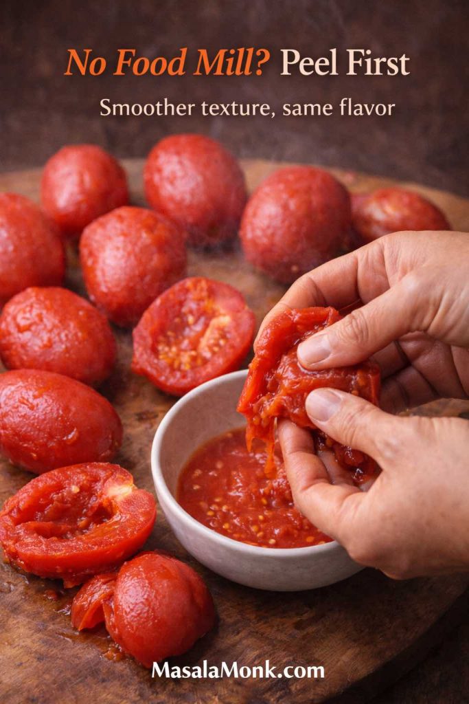 Hands peeling and seeding tomatoes over a bowl to make smooth tomato sauce from fresh tomatoes without a food mill.