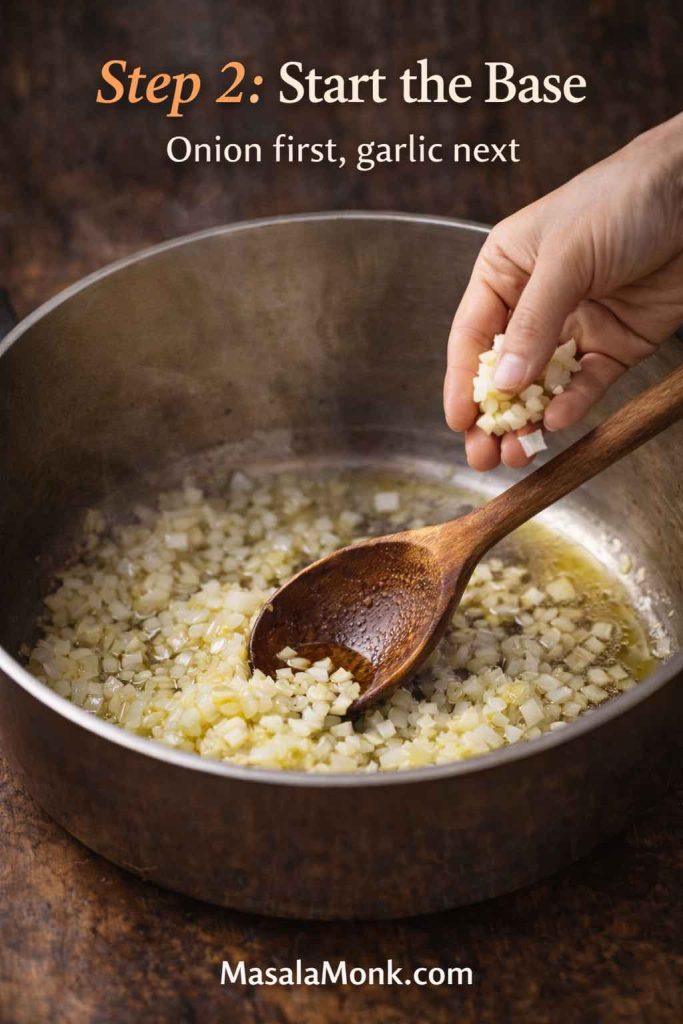 Onion sautéing in olive oil with garlic being added in a pot to start tomato sauce from fresh tomatoes.