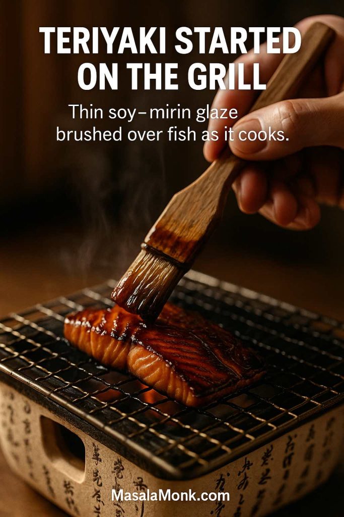 Traditional Japanese teriyaki salmon being brushed with a thin soy–mirin glaze on a tabletop grill, showing the shiny caramelised surface and steam rising.