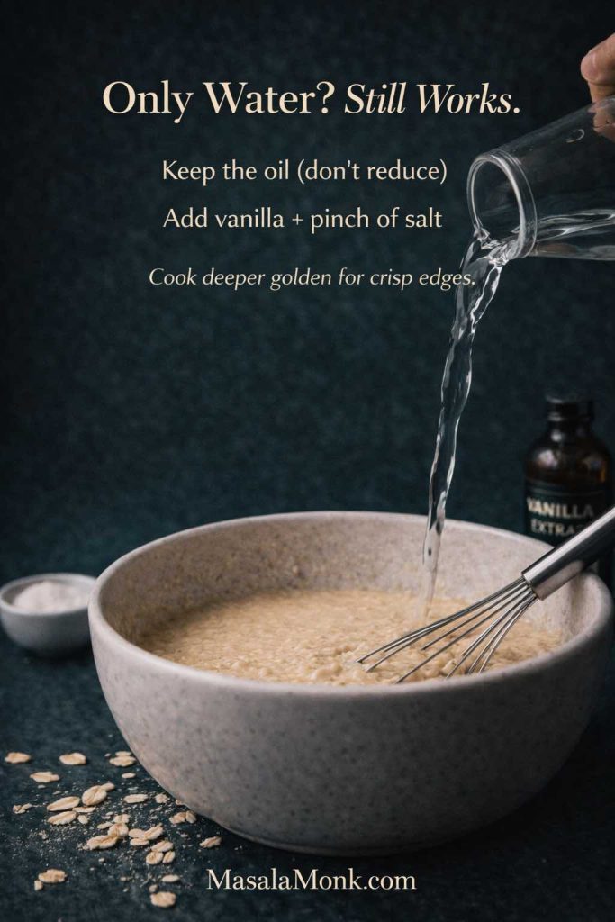 Portrait guide showing water pouring into waffle batter in a mixing bowl with a whisk, vanilla extract bottle and a small bowl of salt nearby, with text overlay “Only Water? Still Works…Keep the oil…Add vanilla + pinch of salt…Cook deeper golden for crisp edges,” and MasalaMonk.com in the footer.