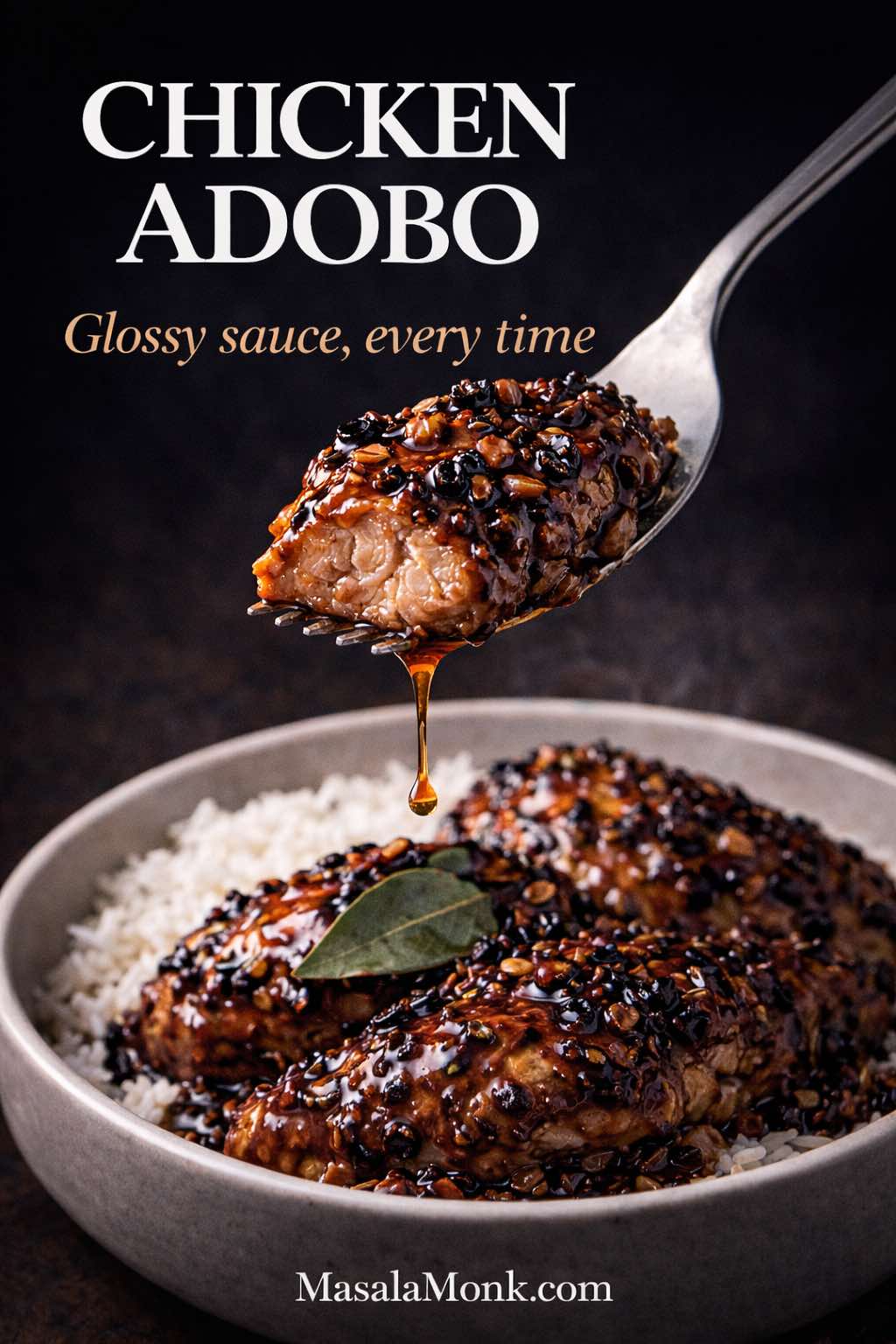 A close-up fork lifts a juicy bite of chicken adobo over a bowl of rice, with a thick glossy soy-vinegar sauce dripping from the bite. The chicken is coated in dark caramelized sauce with visible garlic bits and peppercorns against a moody black background, with the text “Chicken Adobo” and “Glossy sauce, every time” plus MasalaMonk.com at the bottom.