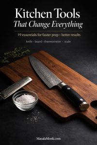 Photorealistic magazine-style cover showing premium kitchen tools on a dark stone surface: chef’s knife on a wooden cutting board with a microplane grater and bowl of flaky salt, titled “Kitchen Tools That Change Everything,” with MasalaMonk.com in the footer.