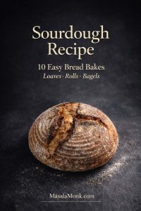 Portrait magazine-style cover on a dark slate background with a rustic sourdough boule dusted with flour. Text overlay reads “Sourdough Recipe” and “10 Easy Bread Bakes — Loaves • Rolls • Bagels,” with “MasalaMonk.com” in the footer.