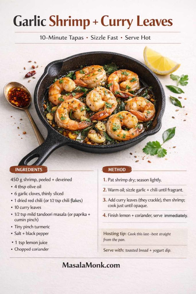 Recipe card for Garlic Shrimp with Curry Leaves showing shrimp cooked in olive oil with sliced garlic, chili, curry leaves, and herbs in a small skillet. Includes ingredient list, four-step method, hosting tip to cook last, and serving suggestion with toasted bread and yogurt dip. MasalaMonk.com footer.