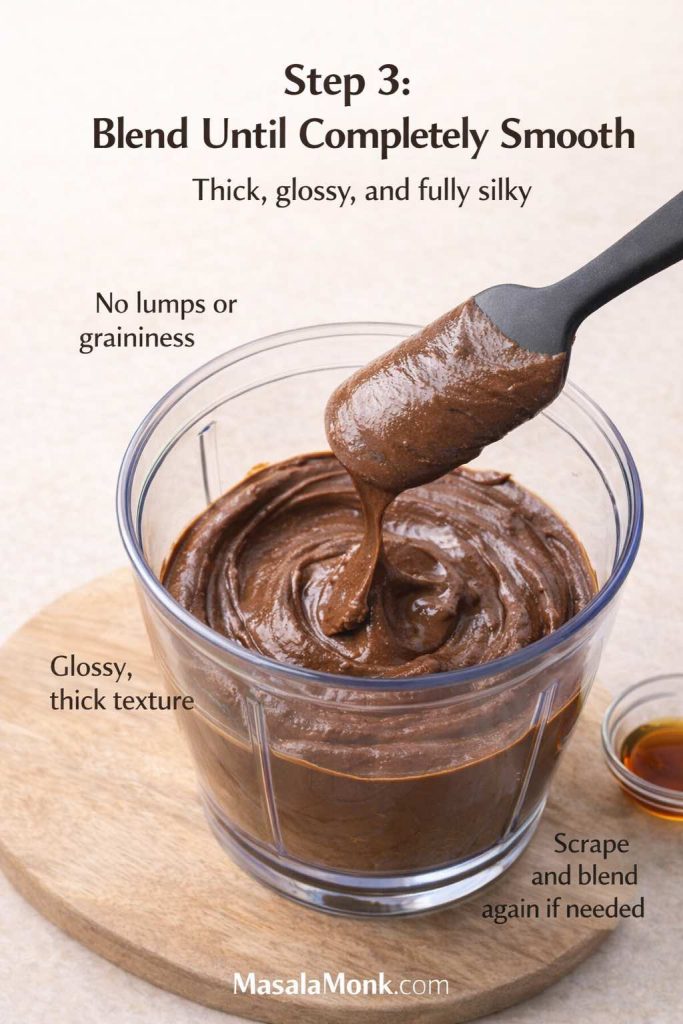 Step 3 for avocado chocolate mousse shows the texture you want before chilling: thick, glossy, and fully smooth, with no lumps or graininess left in the mixture. This visual helps readers judge whether the mousse has been blended enough, which is one of the most important details for getting a silky avocado chocolate mousse instead of a rough or uneven one.