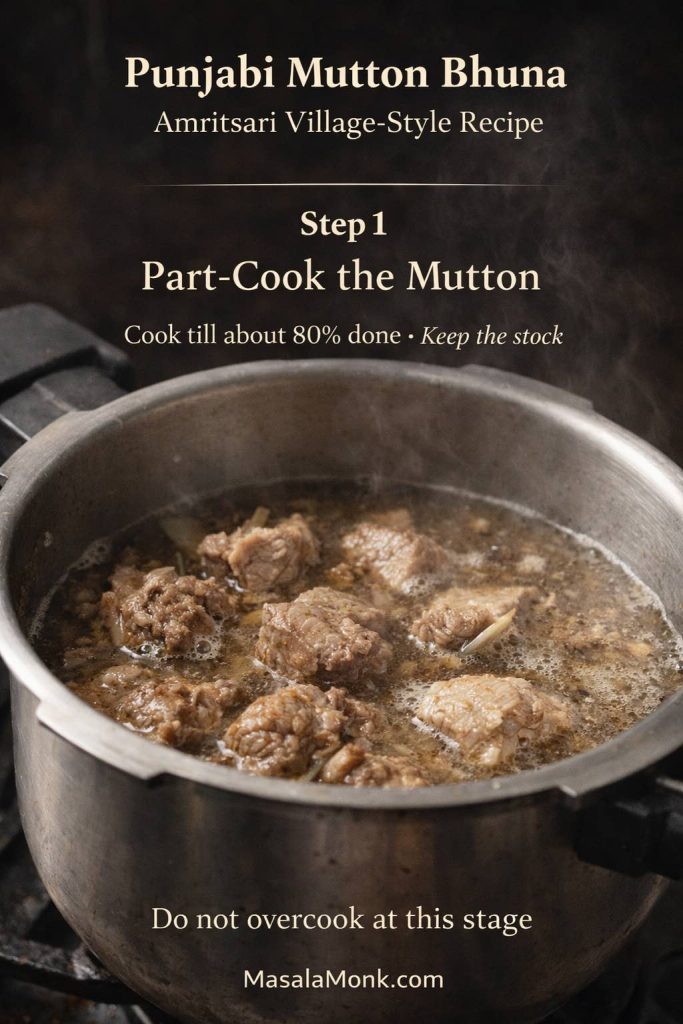 Step 1 image for Punjabi mutton bhuna showing bone-in mutton partially cooked in a pressure cooker with light stock before the final bhuna stage.