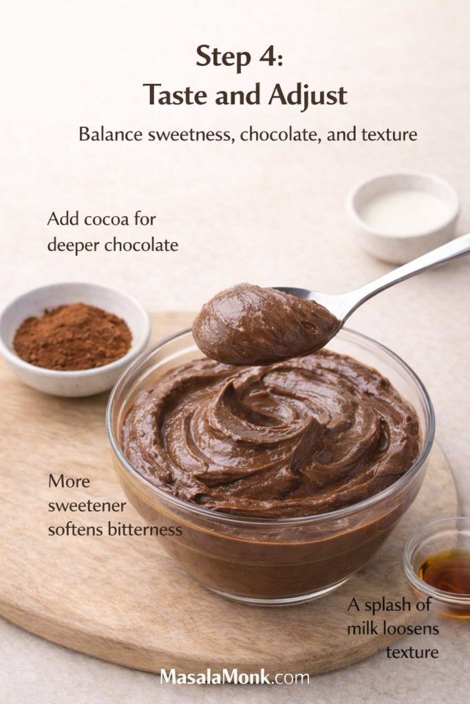 Step 4 image for avocado chocolate mousse showing a spoon tasting the blended mousse with cocoa, sweetener, and milk nearby, illustrating how to adjust chocolate flavour, sweetness, and texture before chilling.