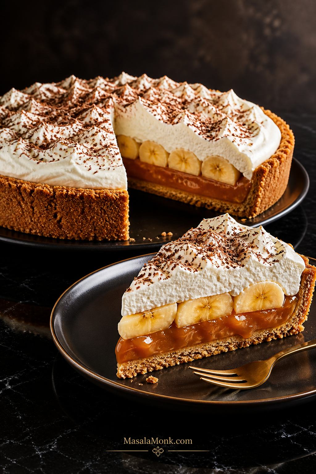 Whole Banoffee Pie with a clean slice showing biscuit base, caramel, bananas, whipped cream, and chocolate shavings.
