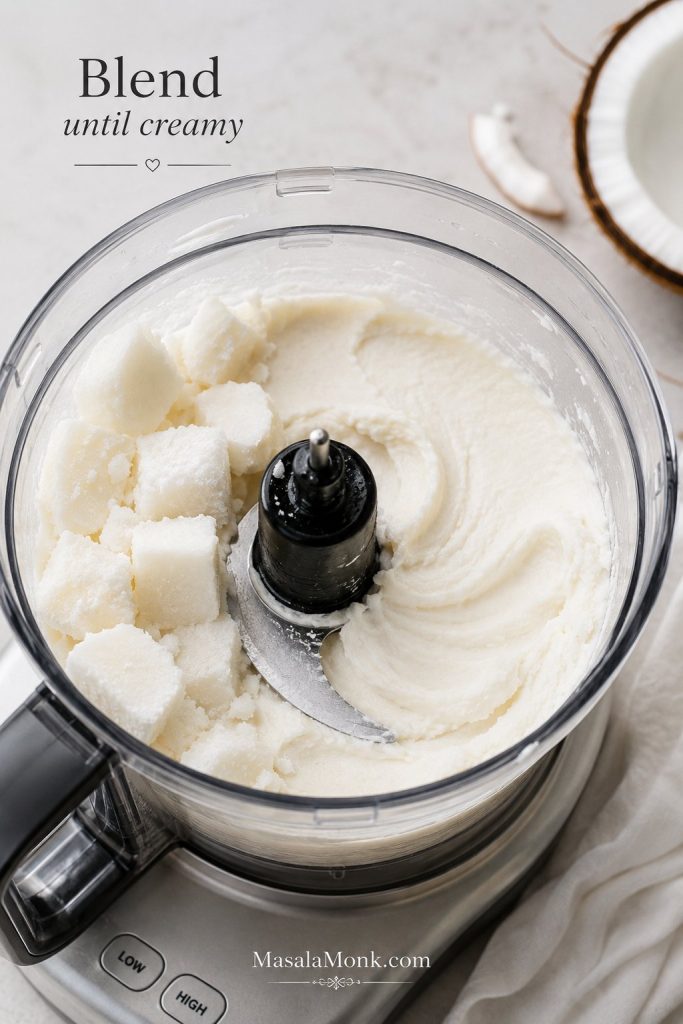 Frozen coconut base cubes blending into a creamy no-churn coconut ice cream texture.