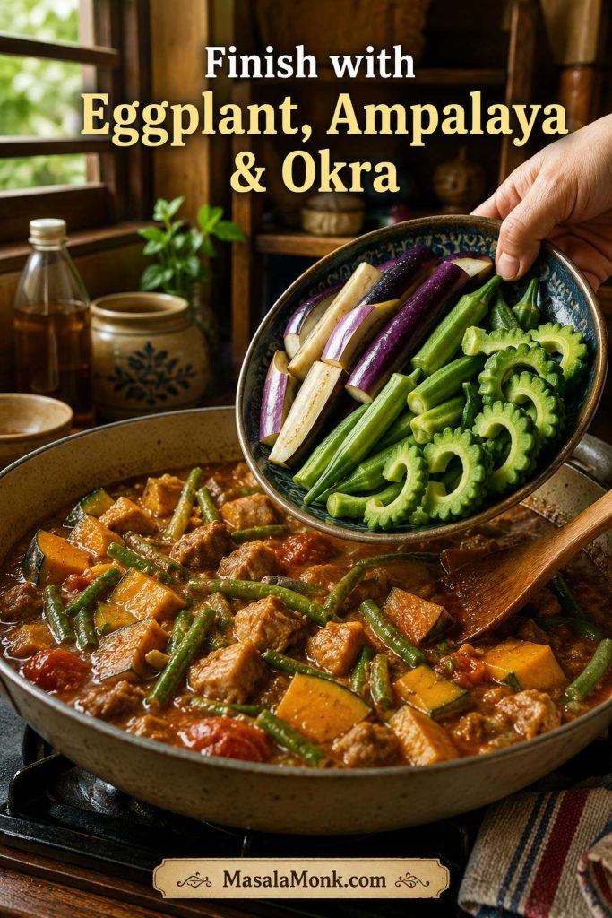 Eggplant, ampalaya, and okra being added last to a pan of Pinakbet Tagalog with squash and long beans already cooking.