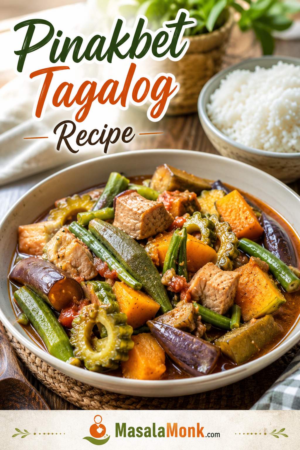 Bowl of Pinakbet Tagalog with pork, squash, okra, eggplant, ampalaya, long beans, and tomato-bagoong sauce, served with rice nearby.