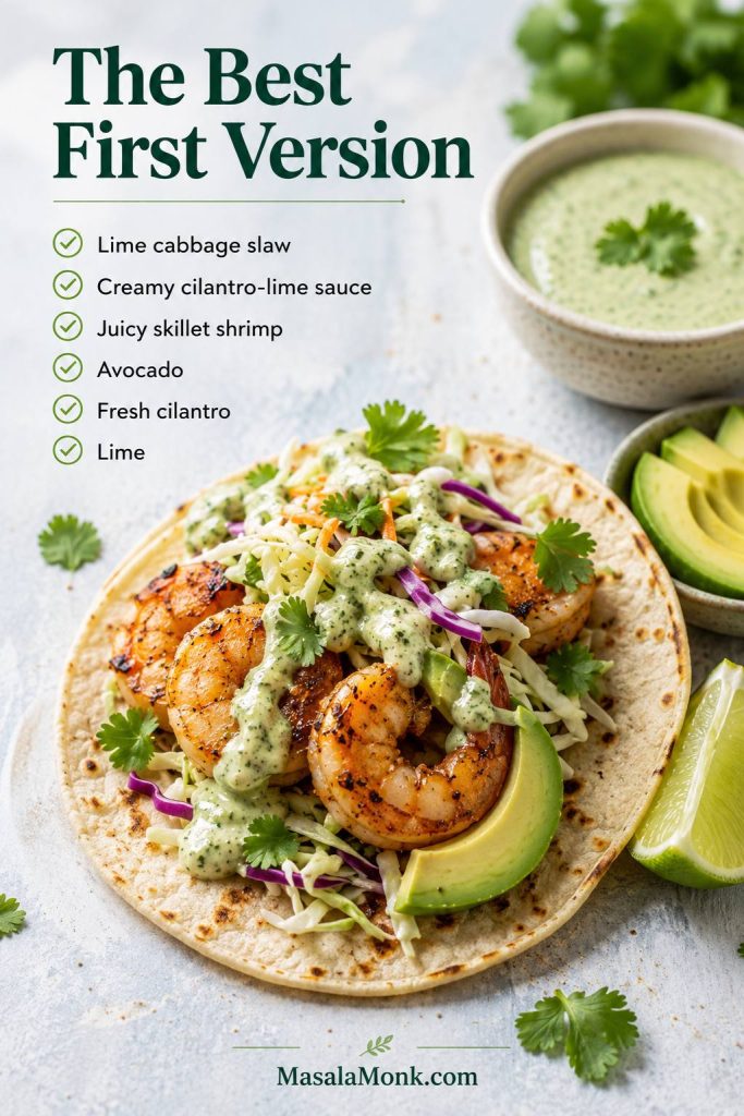 One finished shrimp taco with skillet shrimp, cabbage slaw, avocado, cilantro lime sauce, and fresh lime