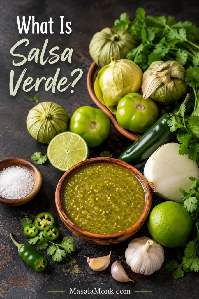 Tomatillos in papery husks with green chiles, cilantro, onion, garlic, lime, salt, and a bowl of salsa verde