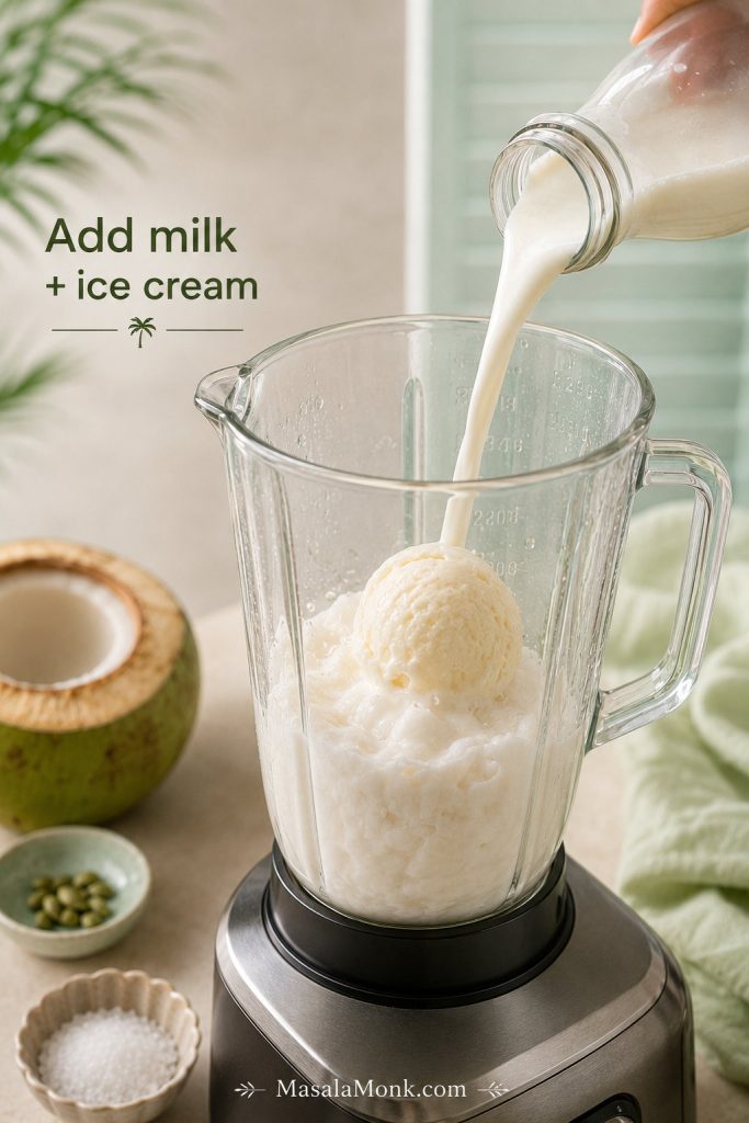 Chilled milk being poured into a blender with tender coconut base and a scoop of vanilla ice cream.