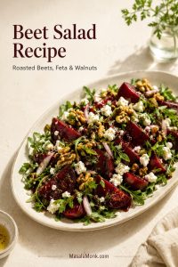This roasted beet salad stands out because it combines sweet beet wedges with salty feta, toasted walnuts, peppery greens, herbs, and a bright lemon-balsamic finish.