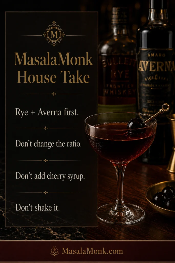A MasalaMonk house take card beside a Black Manhattan cocktail with a dark cherry garnish, showing rules for using rye, Averna, bitters, and no cherry syrup.