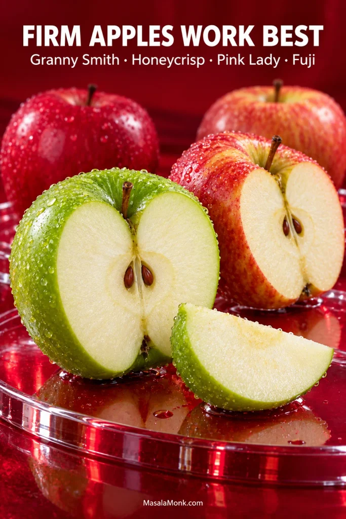 Cut red and green apples with firm pale flesh arranged on a glossy red surface beneath the words “Firm Apples Work Best.”