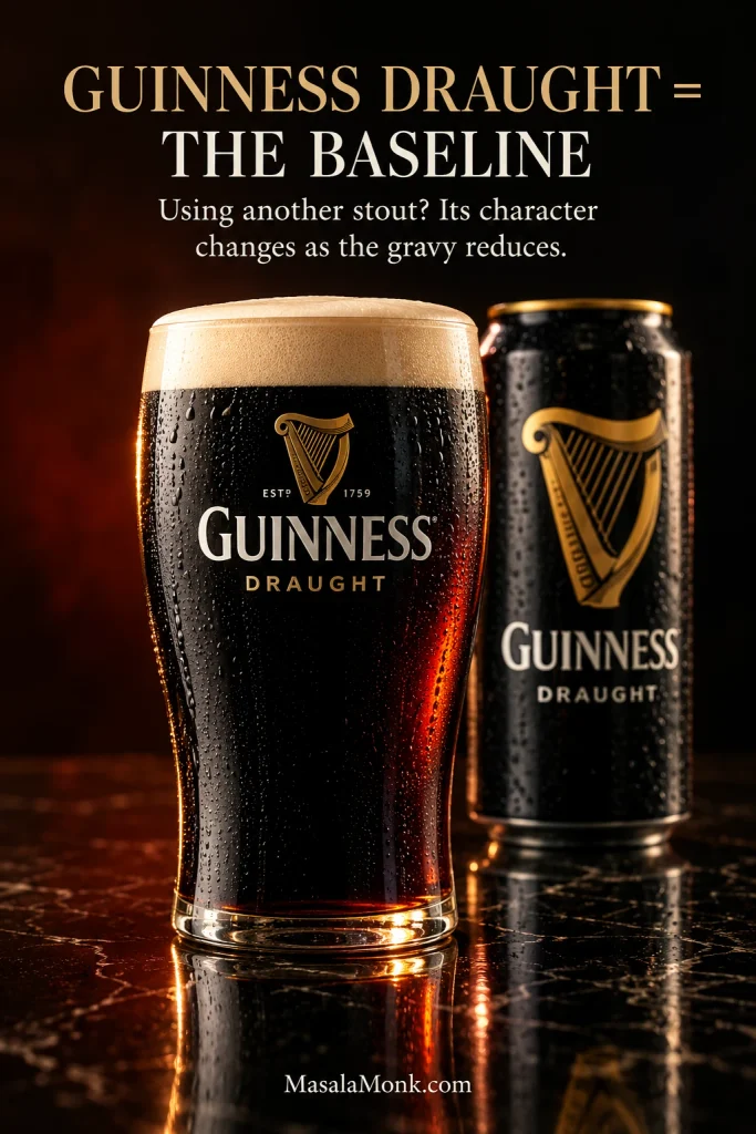 Guinness Draught can and glass of dark stout against a dark reflective background with amber highlights.